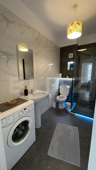 Apartament bloc nou, 72 mp, 2 dormitoare si living, parter, zona Nord - 8
