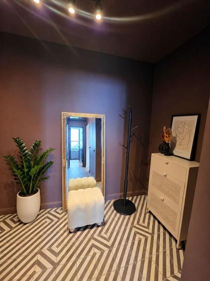 Apartament cu 3 camere semidecomandat, mobilat în Calea Victoriei