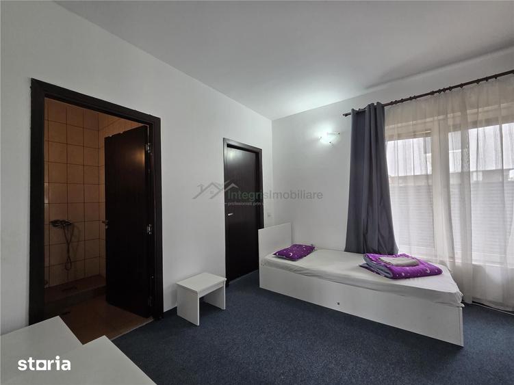 Casă cu 10 camere cu Teren 300 Mp în Sânmartin