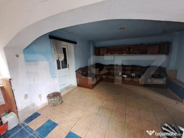 Casă cu 2 camere cu Teren 1400 Mp în Central