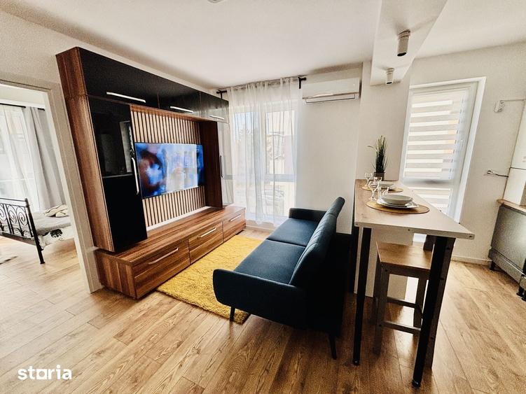 Apartament cu 2 camere, mobilat în Central