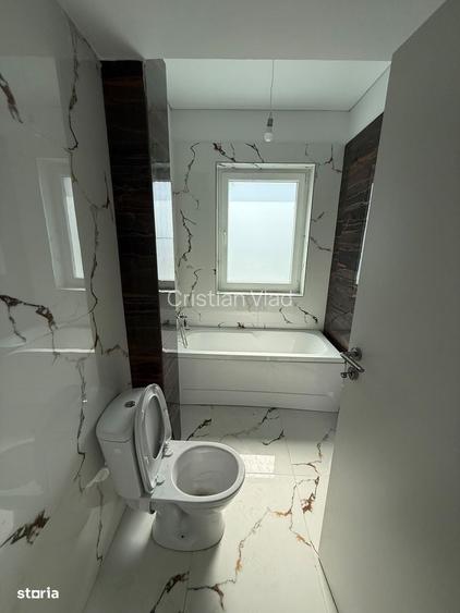 Apartament 2 camere cu terasa de 25mp si loc de parcare subteran.