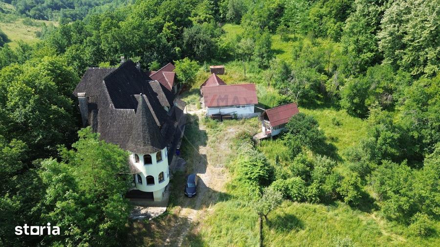 Casă cu Teren 24700 Mp în Copalnic