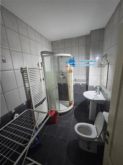 Apartament cu 2 camere semidecomandat, mobilat în Central