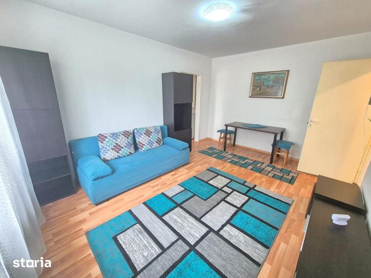 Apartament cu 2 camere semidecomandat, mobilat în Florilor