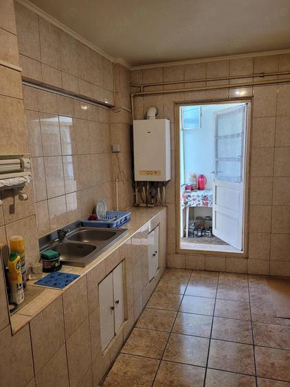 Apartament cu 4 camere decomandat în Prundu
