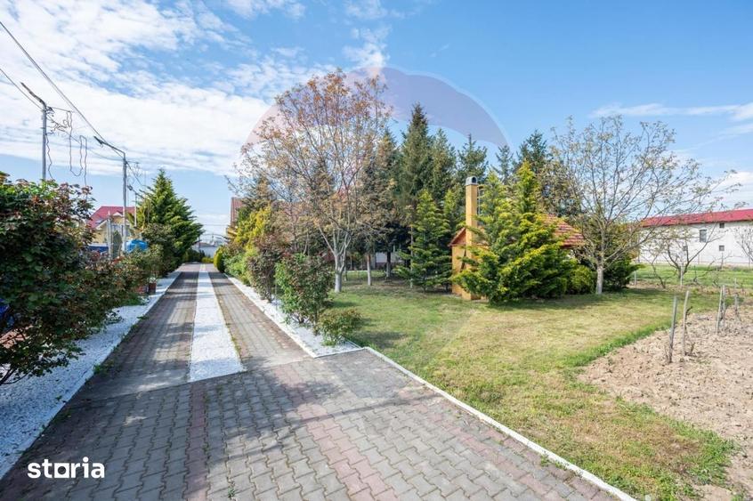 Casă cu Teren 5375 Mp în Sânmartin