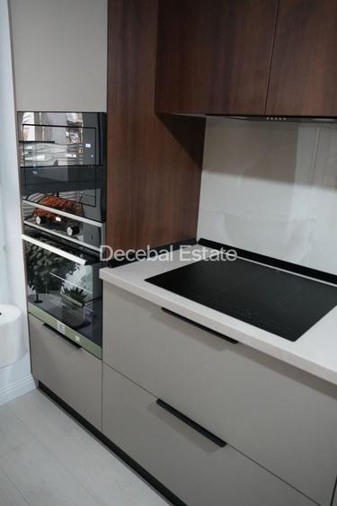 Apartament cu 3 camere semidecomandat, mobilat în Nord