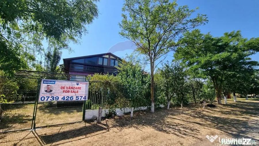 Casă cu 5 camere cu Teren 1000 Mp în Sud