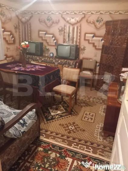 Casă cu 2 camere cu Teren 2000 Mp în Central