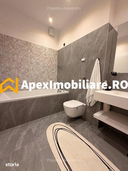 Apartament cu 3 camere decomandat în Băneasa — fotografia 2
