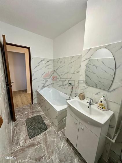 Apartament cu 2 camere semidecomandat în Podu Roș