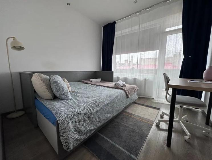 Apartament cu 2 camere semidecomandat, mobilat în Borhanci