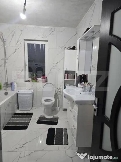 Casă cu 4 camere cu Teren 1500 Mp în Central