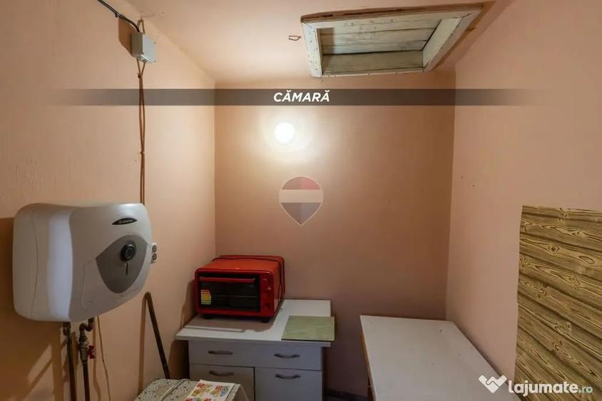 Casă cu 2 camere cu Teren 1300 Mp în Copalnic