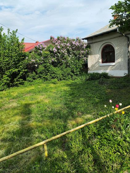 Casă cu 5 camere cu Teren 933 Mp în Democrației