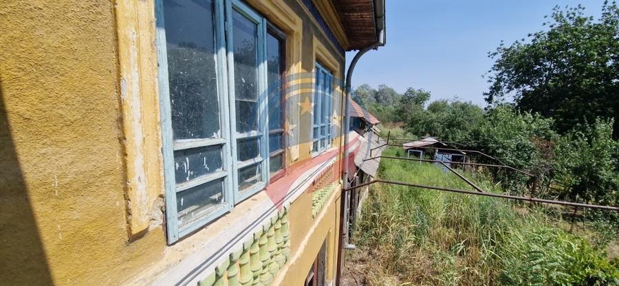 Casă individuală cu 5 camere cu Canalizare în Bâzdâna
