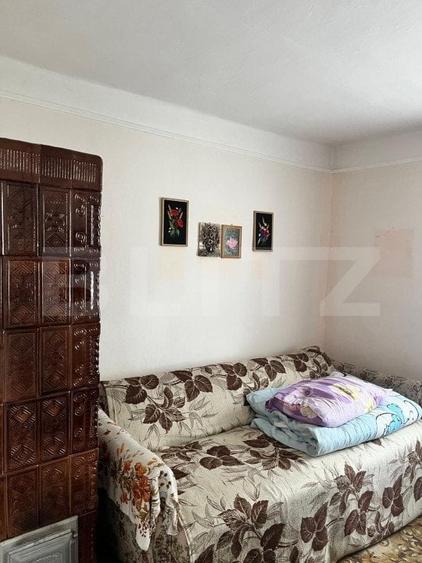 Casă individuală cu 2 camere cu Teren 714 Mp în Siret