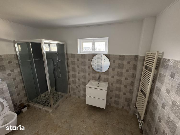 Casă cu 4 camere cu Teren 1000 Mp în Holboca