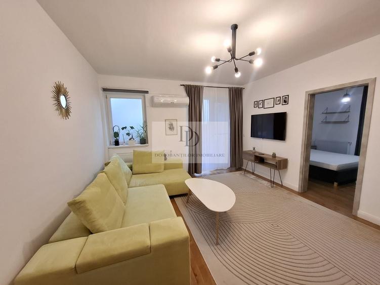 Apartament cu 2 camere semidecomandat, mobilat în Borhanci