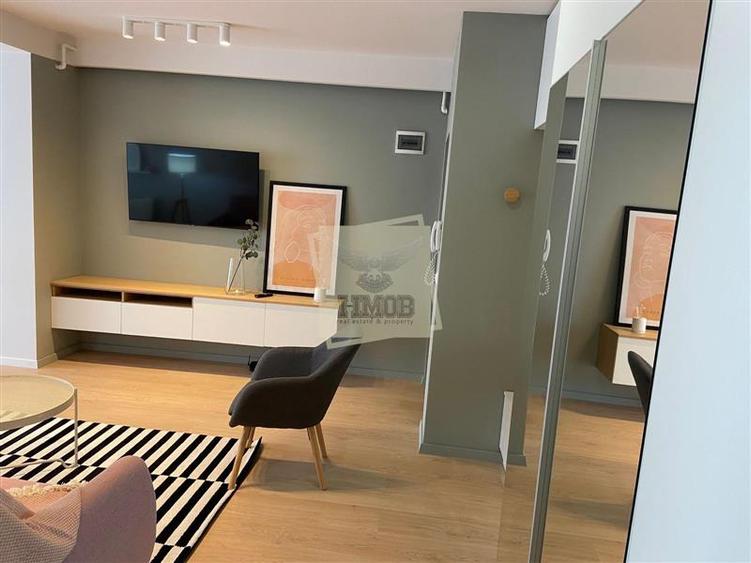 Apartament cu 2 camere semidecomandat, mobilat în Central