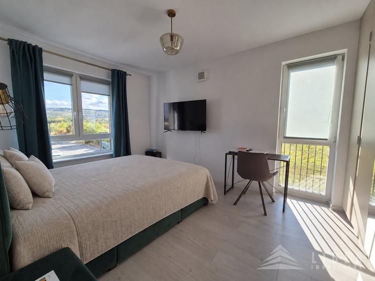 Apartament cu 2 camere semidecomandat, mobilat în Bună Ziua