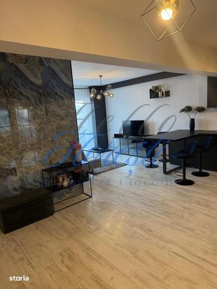 Apartament cu 3 camere semidecomandat, mobilat în Central