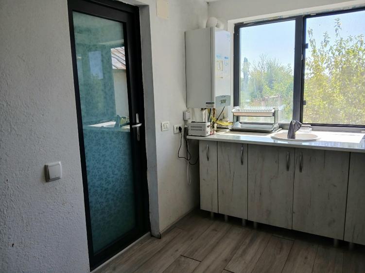 Casă individuală cu 2 camere cu Teren 1568 Mp în Roata de Jos
