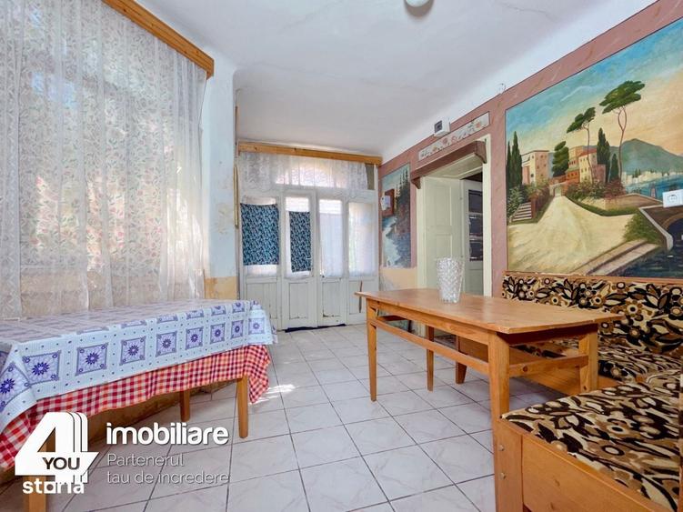 Casă cu 4 camere cu Teren 1459 Mp în Secusigiu