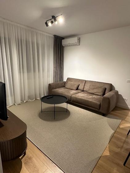 Apartament cu 2 camere semidecomandat, mobilat în Podu Roș