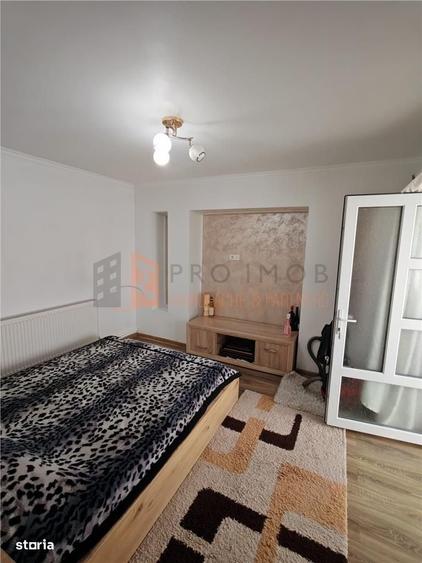 Casă cu 4 camere decomandat în Căpățânești