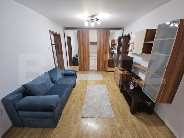 Apartament cu 2 camere semidecomandat, mobilat în Podu Roș