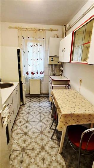 Apartament cu 2 camere nedecomandat, mobilat în Podu Roș
