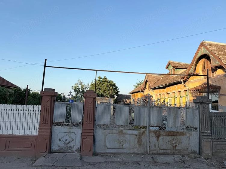 Casă cu 2 camere cu Teren 1200 Mp în Central