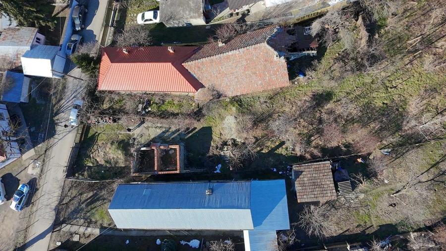 Casă cu 4 camere cu Teren 1974 Mp în Comana