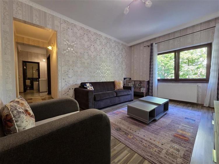 Apartament central cu acces la gradina si 2 locuri parcare - 3