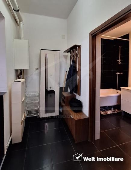 Apartament cu 3 camere semidecomandat, mobilat în Central