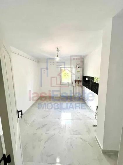 Apartament cu 4 camere decomandat în Filiași