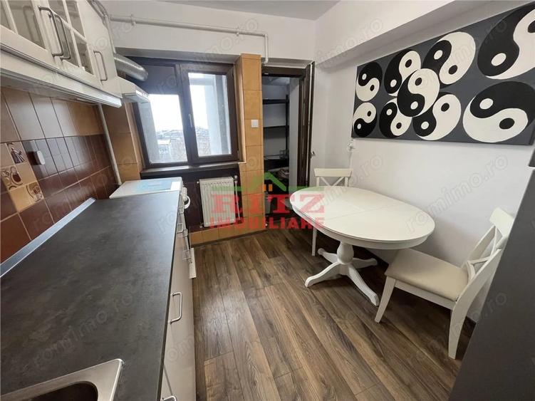 Apartament cu 3 camere decomandat în