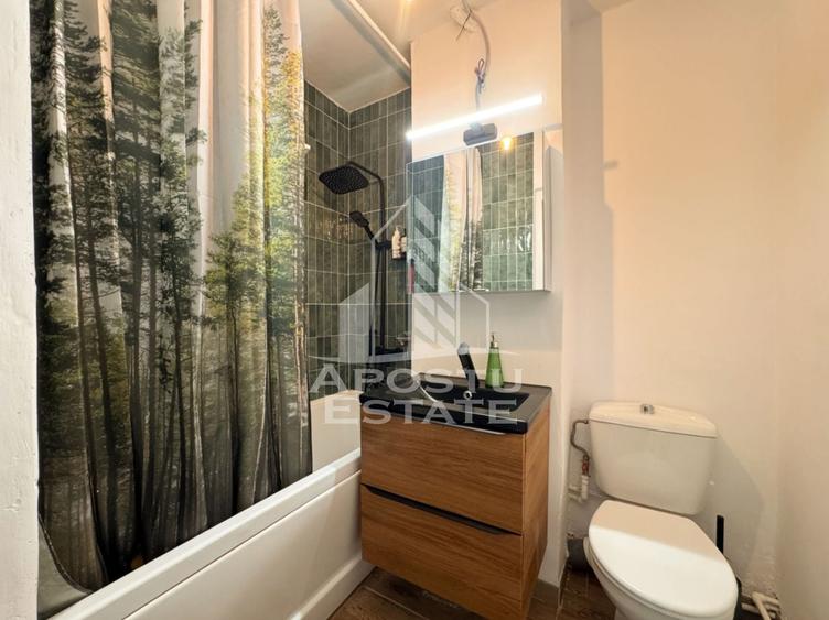 Apartament cu 2 camere semidecomandat, mobilat în Central