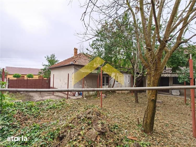 Casă cu 4 camere cu Teren 1199 Mp în Central
