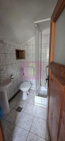 Casă individuală cu 4 camere cu Canalizare în Sud