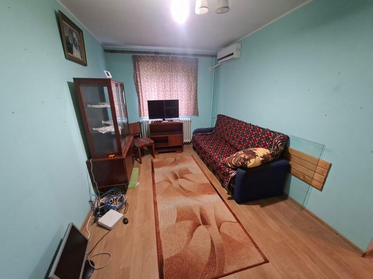 Apartament cu 2 camere semidecomandat în Podu Roș