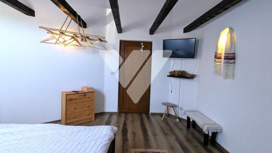 Casă individuală cu 7 camere cu Teren 430 Mp în Păltiniș
