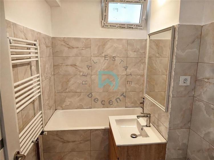 Apartament cu 3 camere decomandat în Tractorul