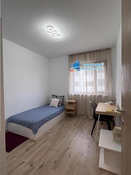 Apartament cu 4 camere semidecomandat, mobilat în Băneasa
