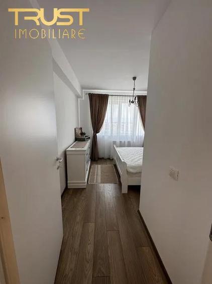 Apartament cu 2 camere semidecomandat, mobilat în Tractorul