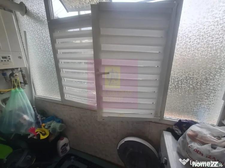 Apartament cu 3 camere semidecomandat în Cuza