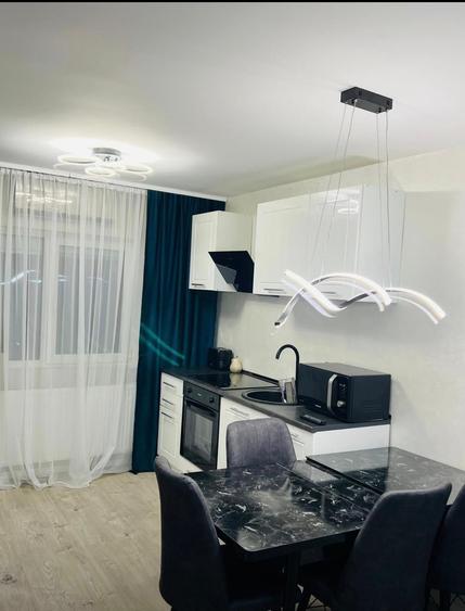 Apartament cu 4 camere decomandat în Nufărul