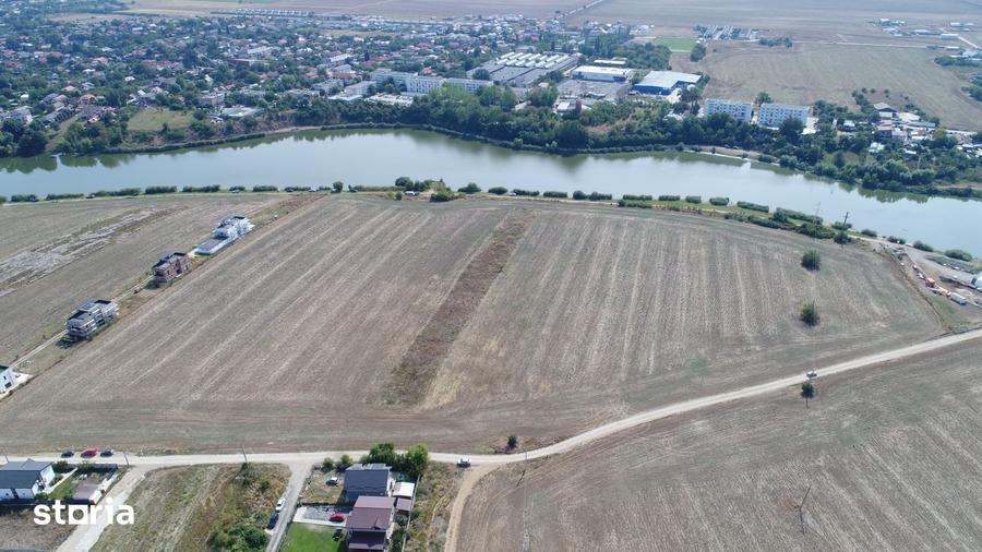 Teren 5.000 mp cu deschidere directa la lac, in Balotesti - 2